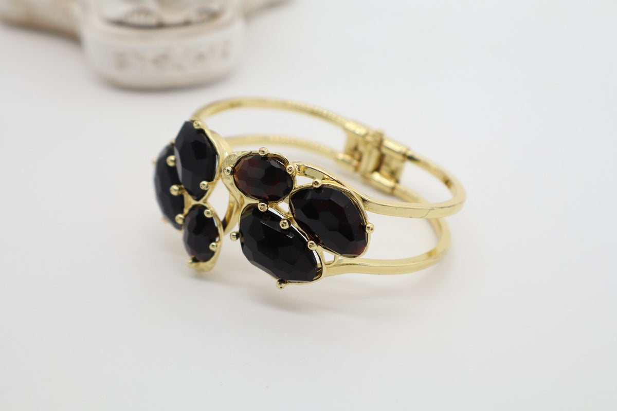 Bracciale Rigido in Bronzo Dorato con Onice Nera Sfaccettata