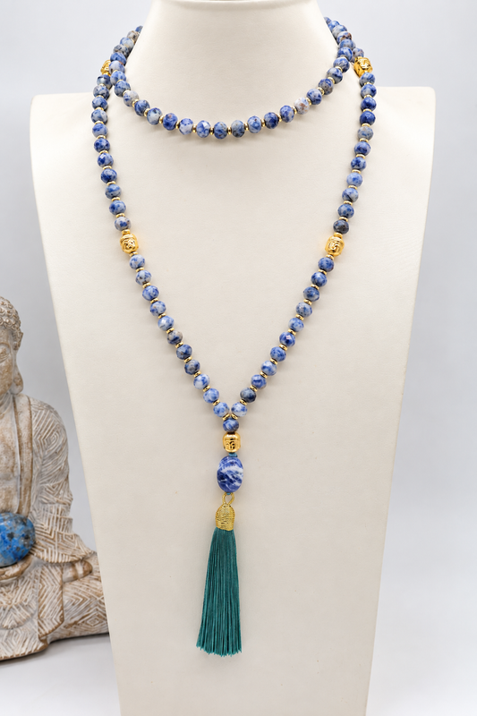 Mala Namtso in sodalite naturale con 108 grani, rondelle sfaccettate 8x6 mm, ematite dorata, elemento ovale finale in sodalite e nappina turchese