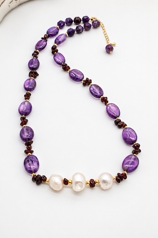 Collana Shahrazad in ametiste ovali lisce 14x10 mm e chips di granato