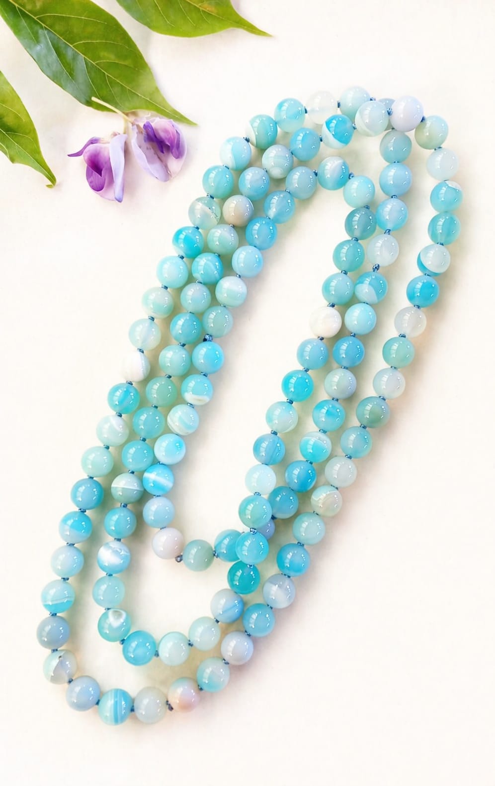 Collana lunga 120 cm in agata Brasiliana celeste naturale – sfere da 10 mm Eterea Natural Stone