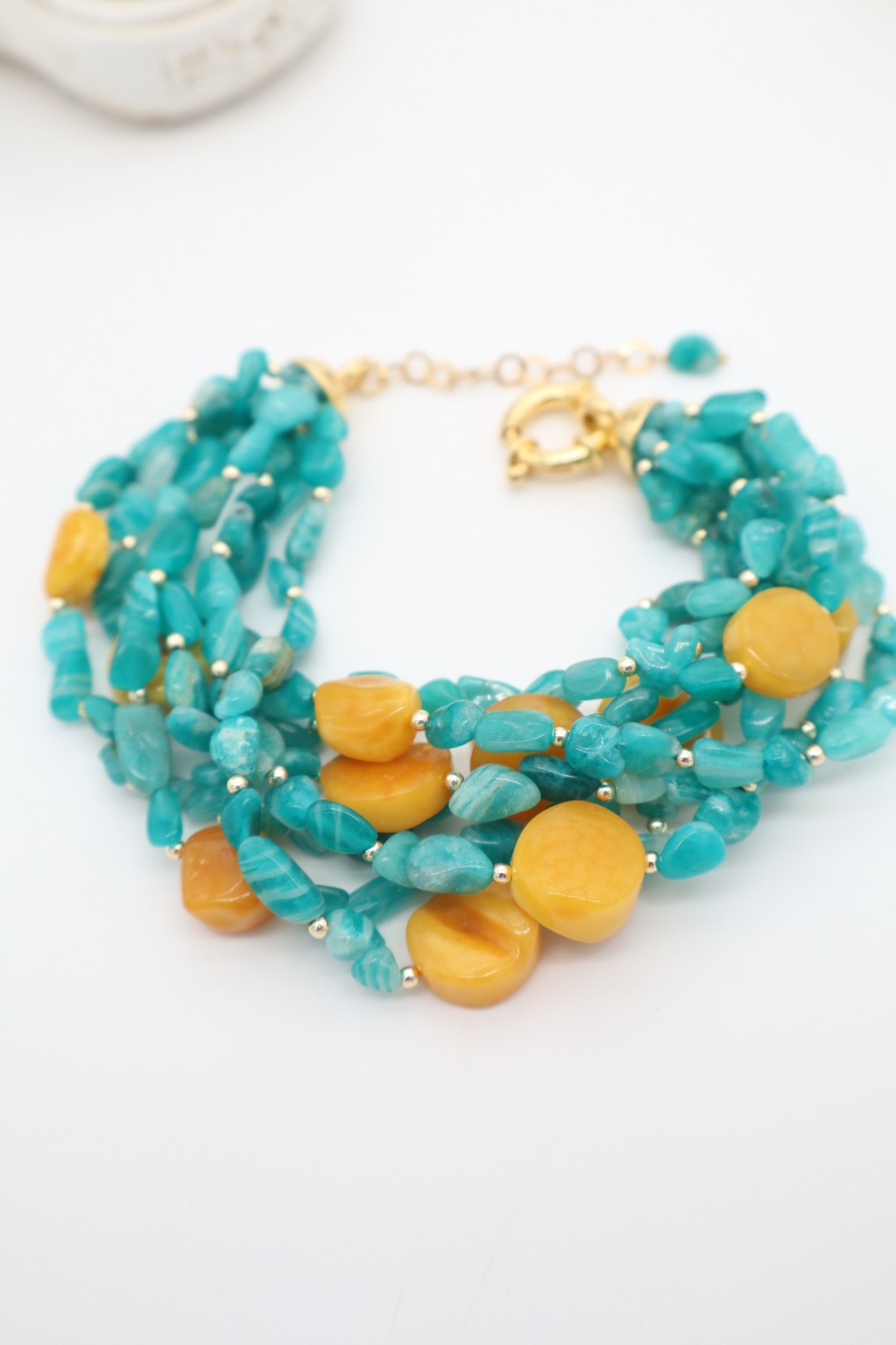 Bracciale sette fili in amazzonite e ambra color miele