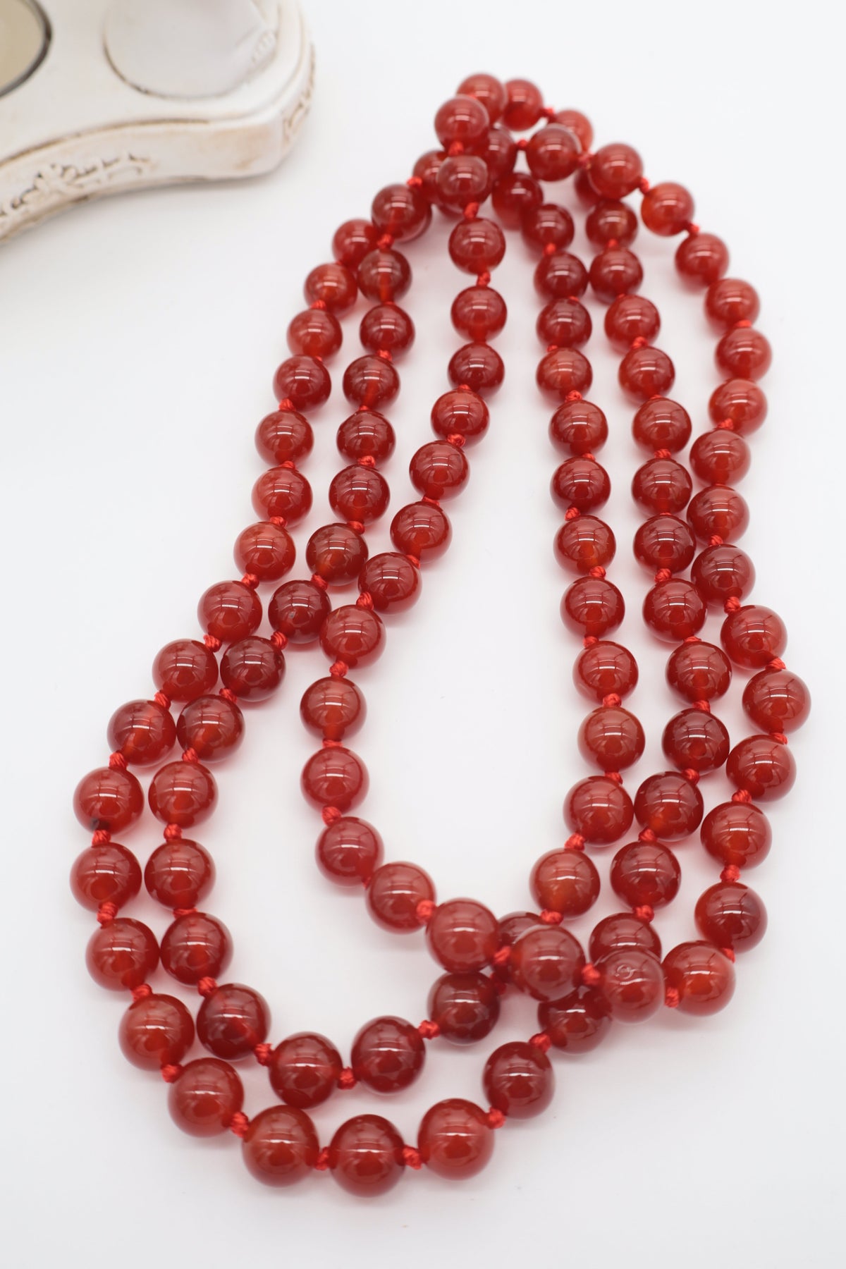 Collana lunga in Corniola naturale – 120 cm – Pietre 10 mm – Annodata a mano