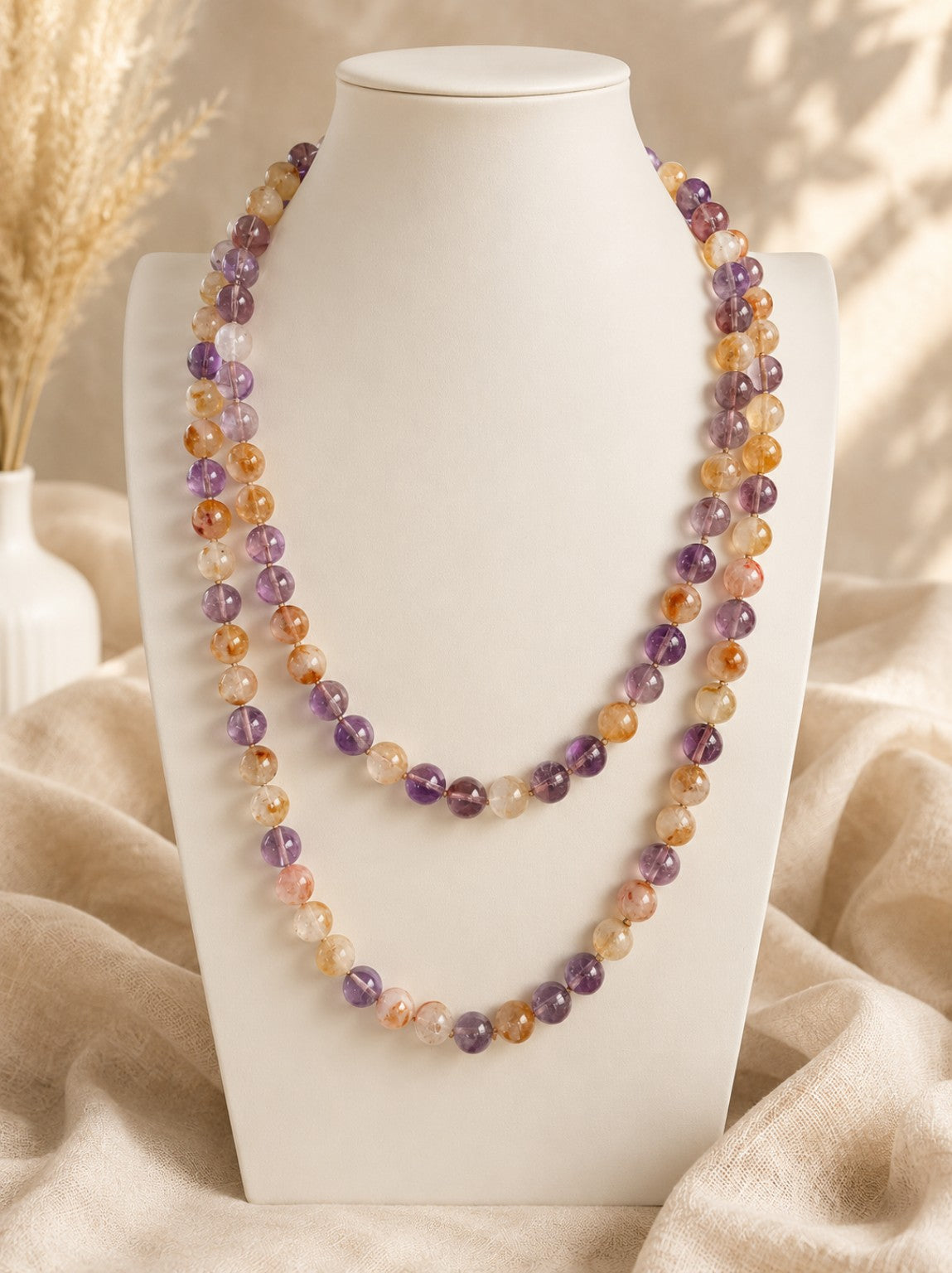Collana lunga in ametrino naturale da 120 cm con sfere da 10 mm annodate a mano. Eterea Natural Stone
