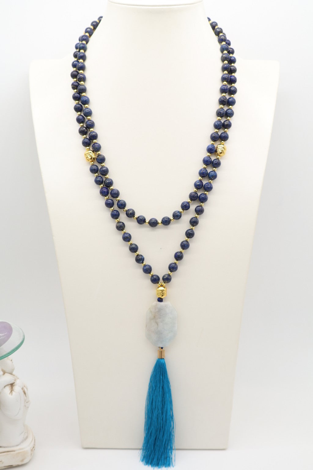 Mala Akasha con 108 grani di Lapislazzuli da 8 mm, Acquamarina naturale sfaccettata, Ematite dorata e Buddha dorati.